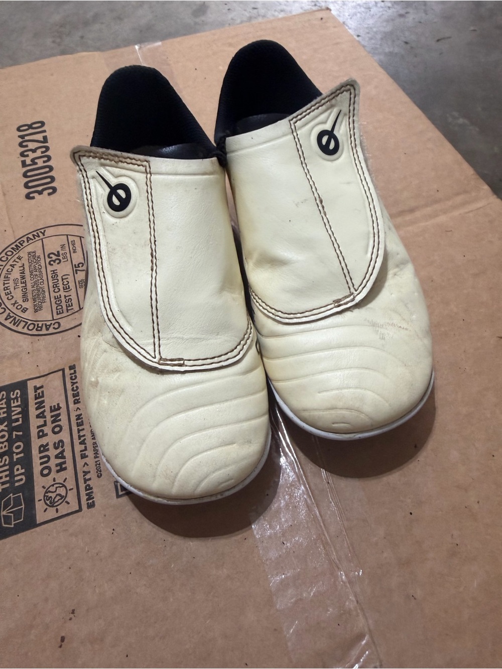 Nike Kids Slip-On Soccer Cleats in Cream and Black
